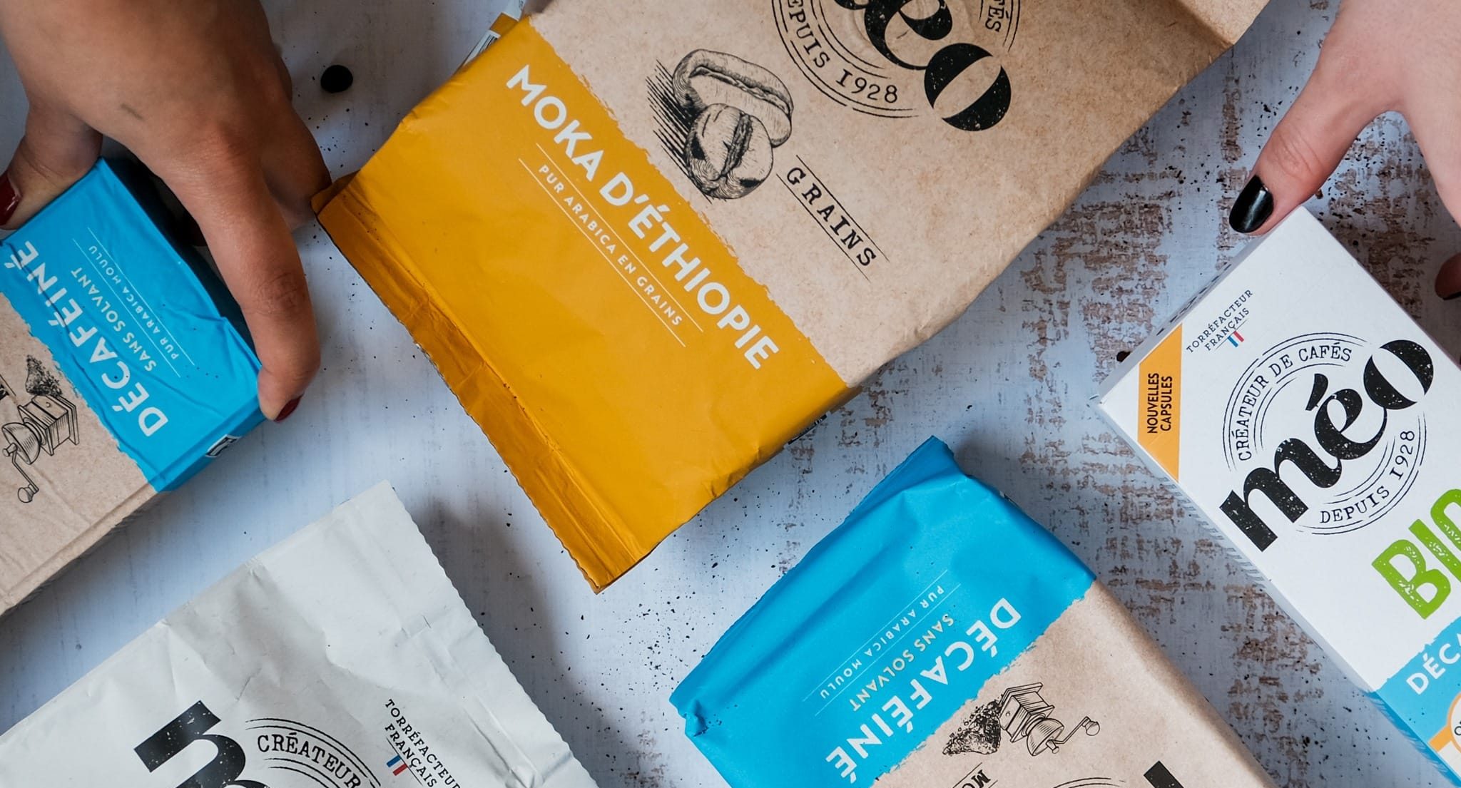 Paquets de cafés Méo Moulus, en grains, en capsules moka et décaféiné